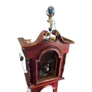 A photo of the top section of the clock