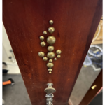 Brass split pins in the side of the clock