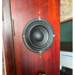 The side of the clock showing a speaker